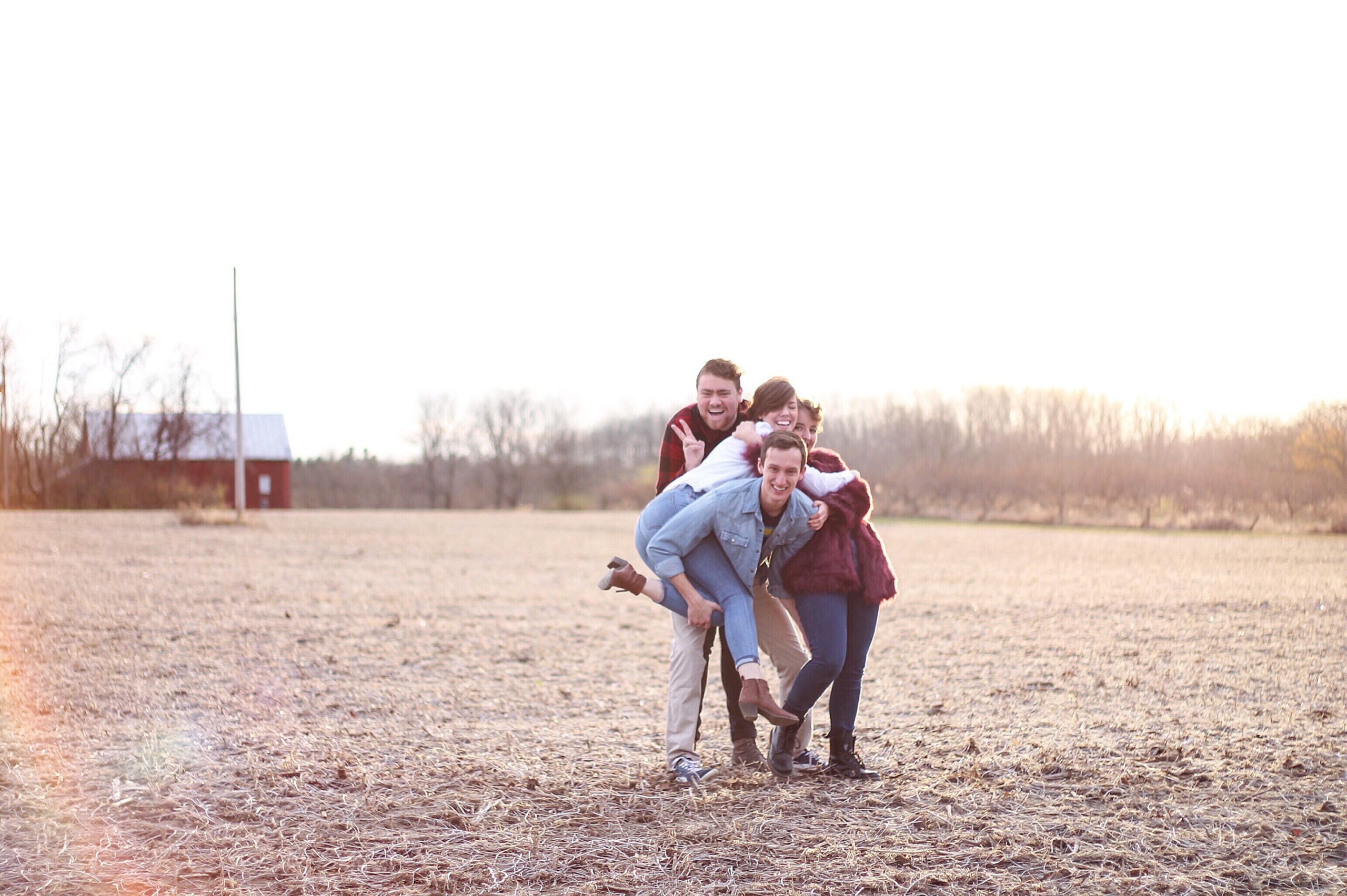 Photo of a group of friends posing together for a fun photo.