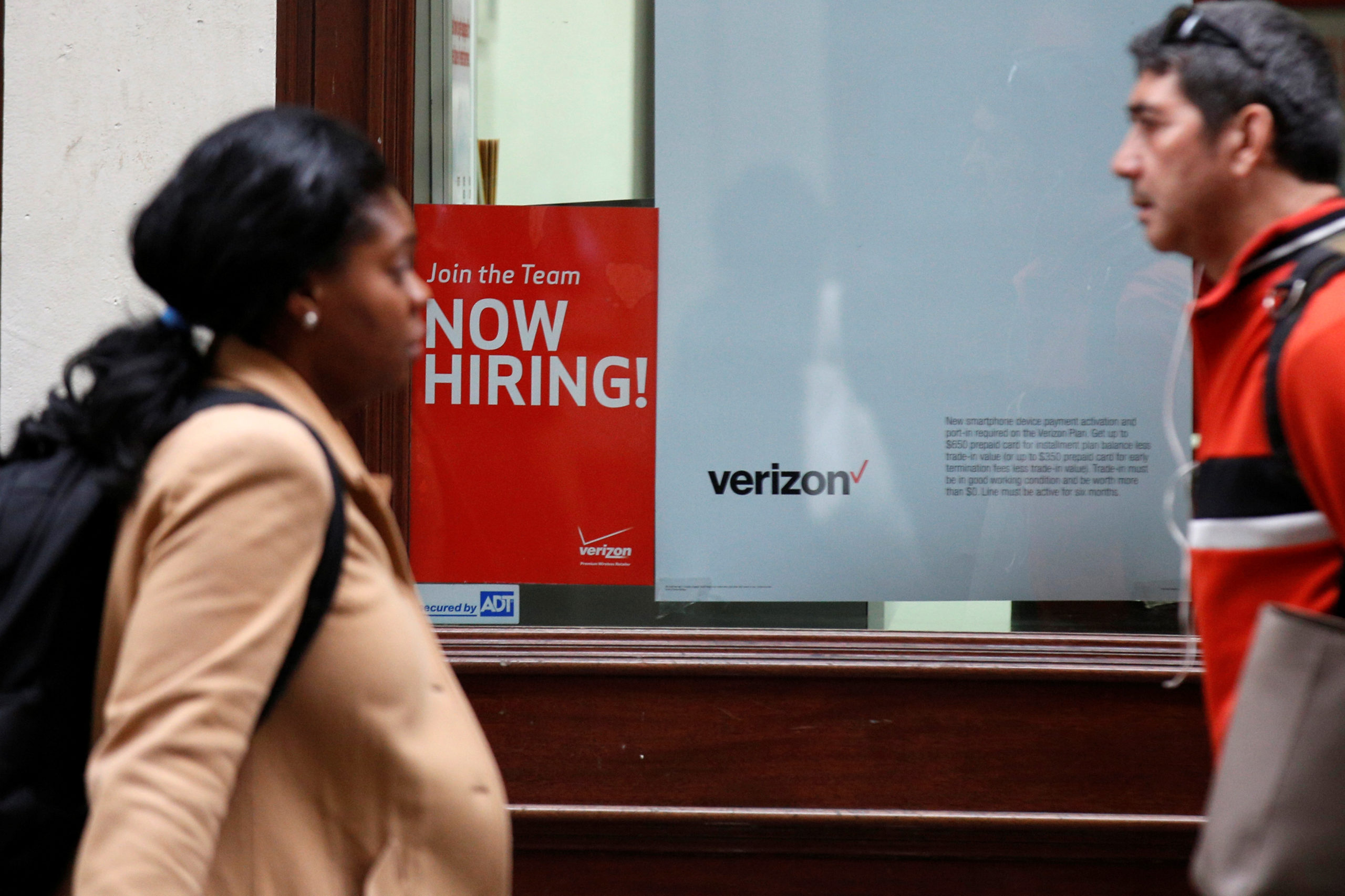 Photo of a now-hiring sign