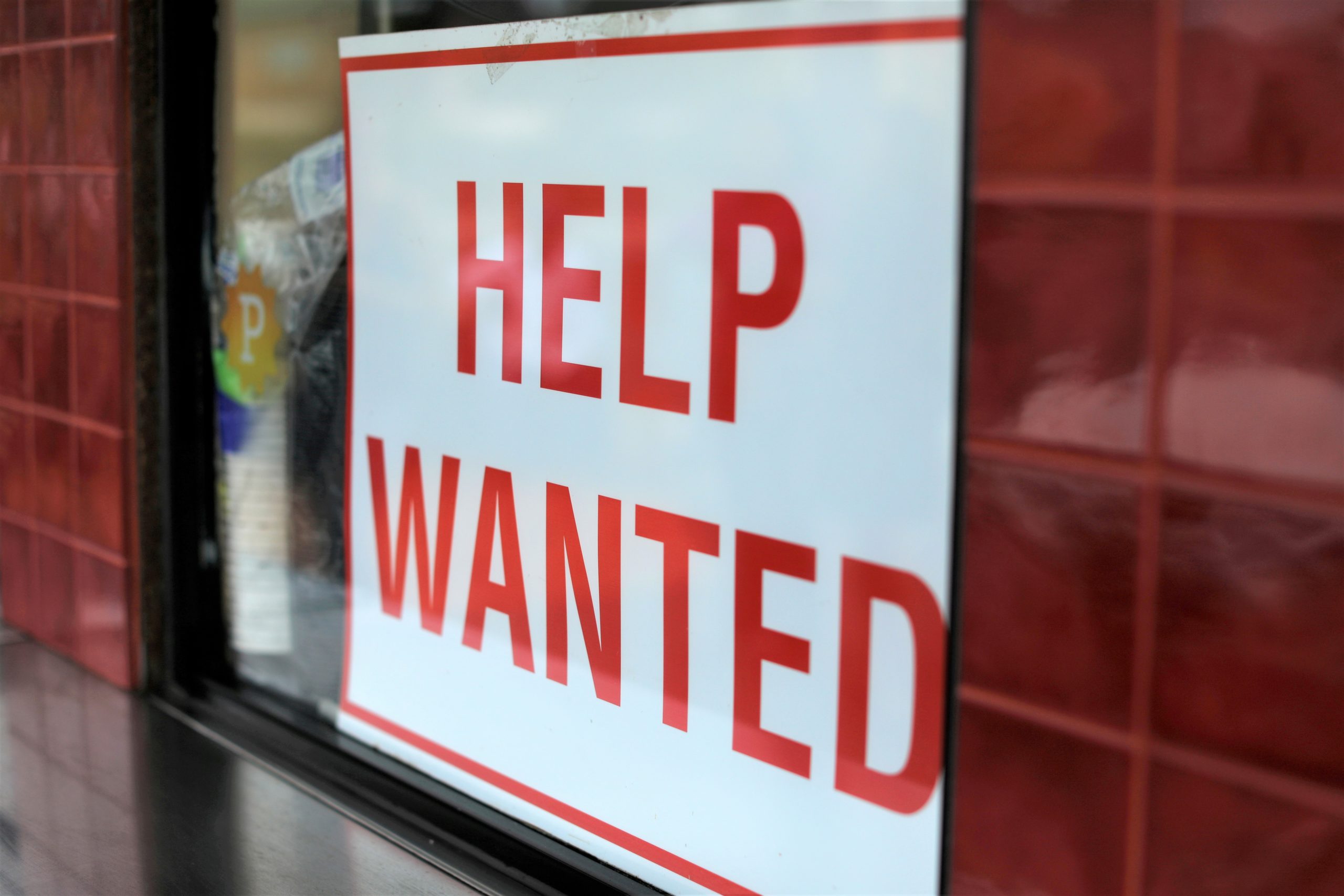 A help wanted sign is posted at a taco stand in Solana Beach, California, U.S., July 17, 2017.