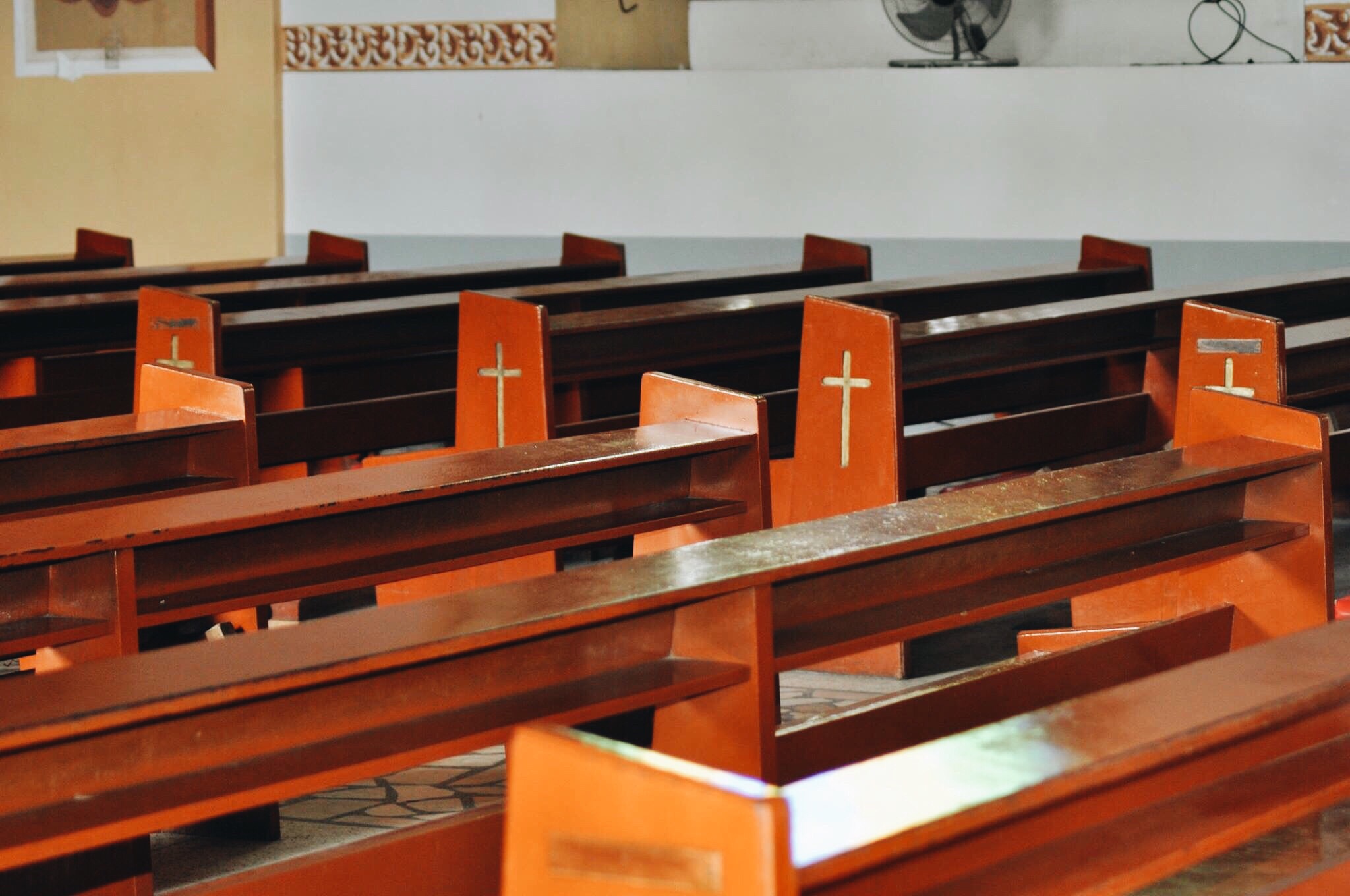 Photo of empty pews in a church