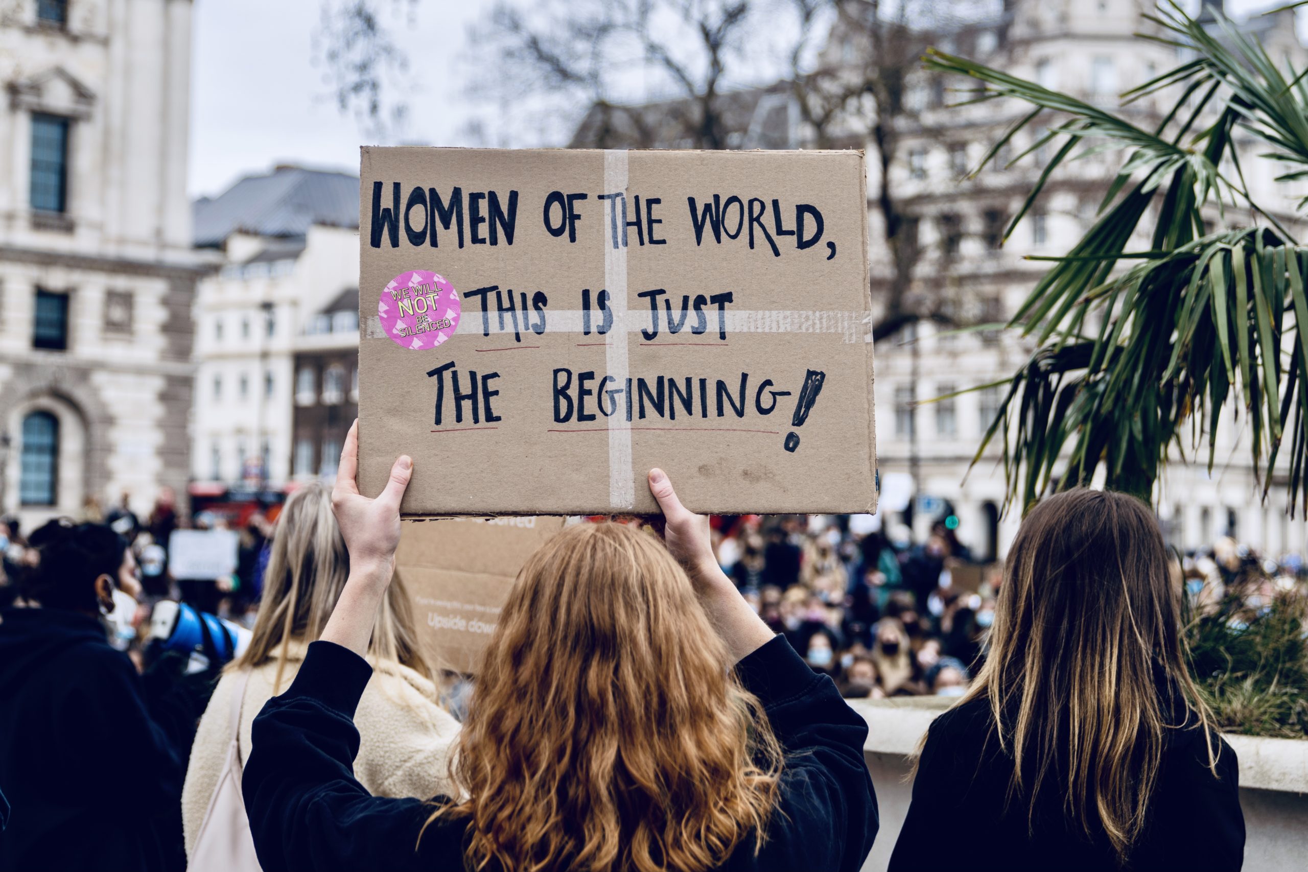 Woman holding a sign in protest